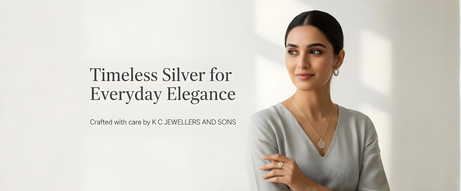 Elegant woman wearing 925 silver necklace, earrings and ring by K C JEWELLERS AND SONS